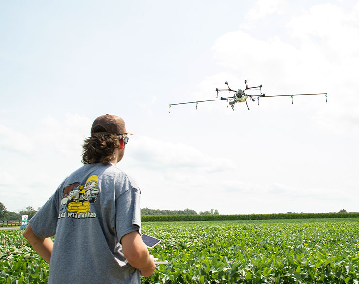 Agriculture student flies a drone