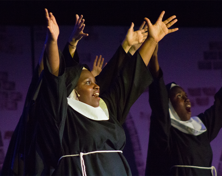 Students perform a scene from Sister Act.