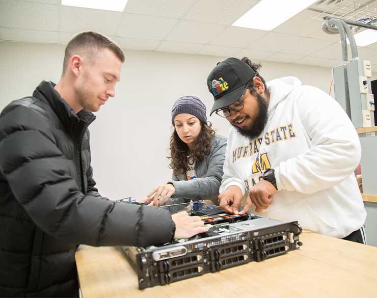 Students work on a computer