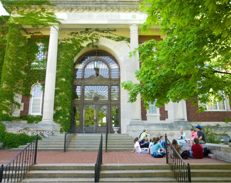 Class meeting on the steps of Pogue Library