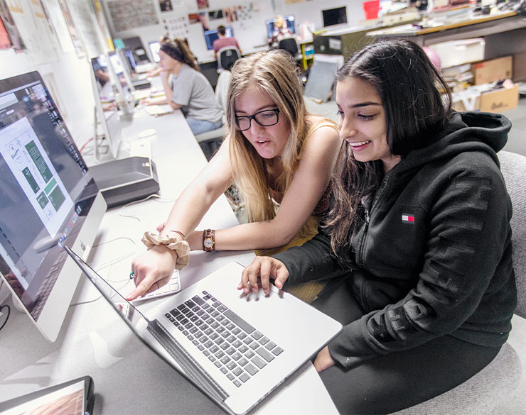 Students help each other in Hart Hall computer lab
