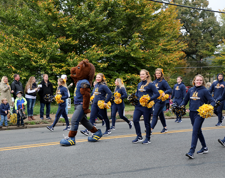 Dunker leads the Homecoming parade.