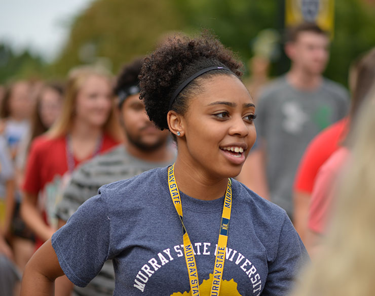 happy student at parade of racers