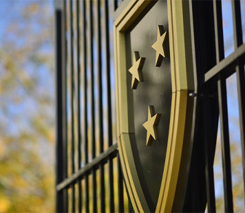 Close up of shield on gate