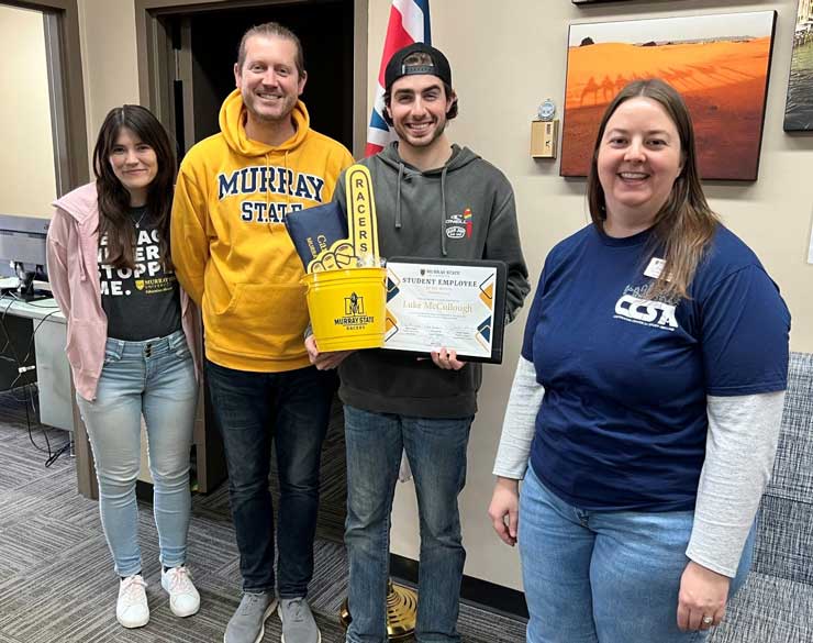 McCullough is presented with certificate