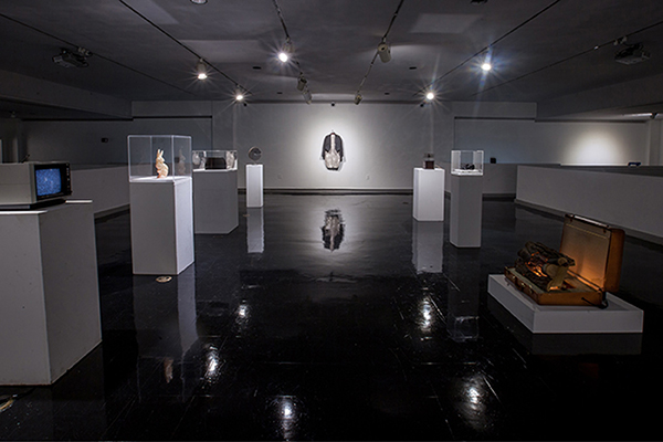The Eagle Upper Gallery utilizes minimal lighting and spotlights to emphasize nostalgic pieces.