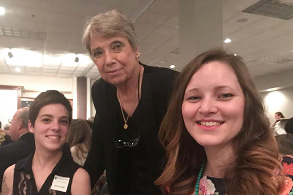 Three women smile for the camera at one of our many Art & Design events. 