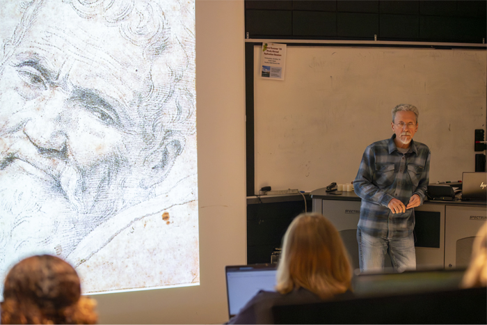 Dr. ZB Smetana lectures art history students about Michelangelo. 