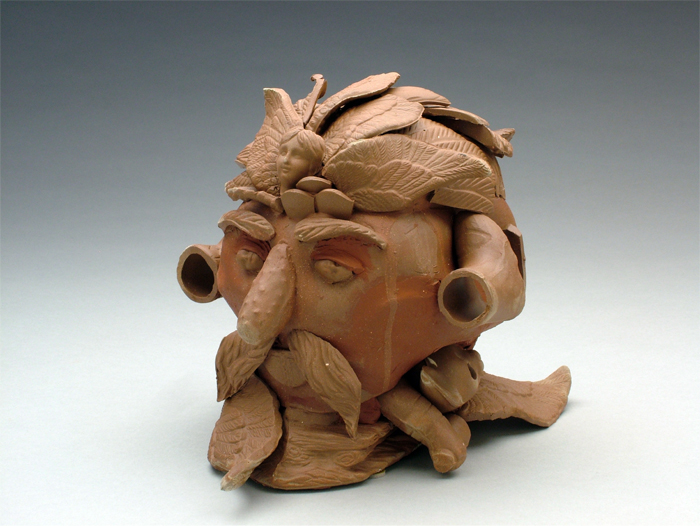 A ceramic sculpture of a man’s head made by student Emily Glowicki. 