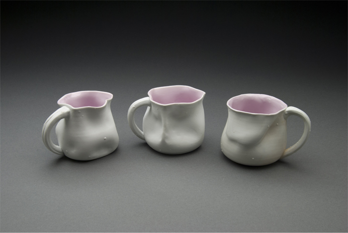 Ceramic mugs made by student Troian Cummings. 