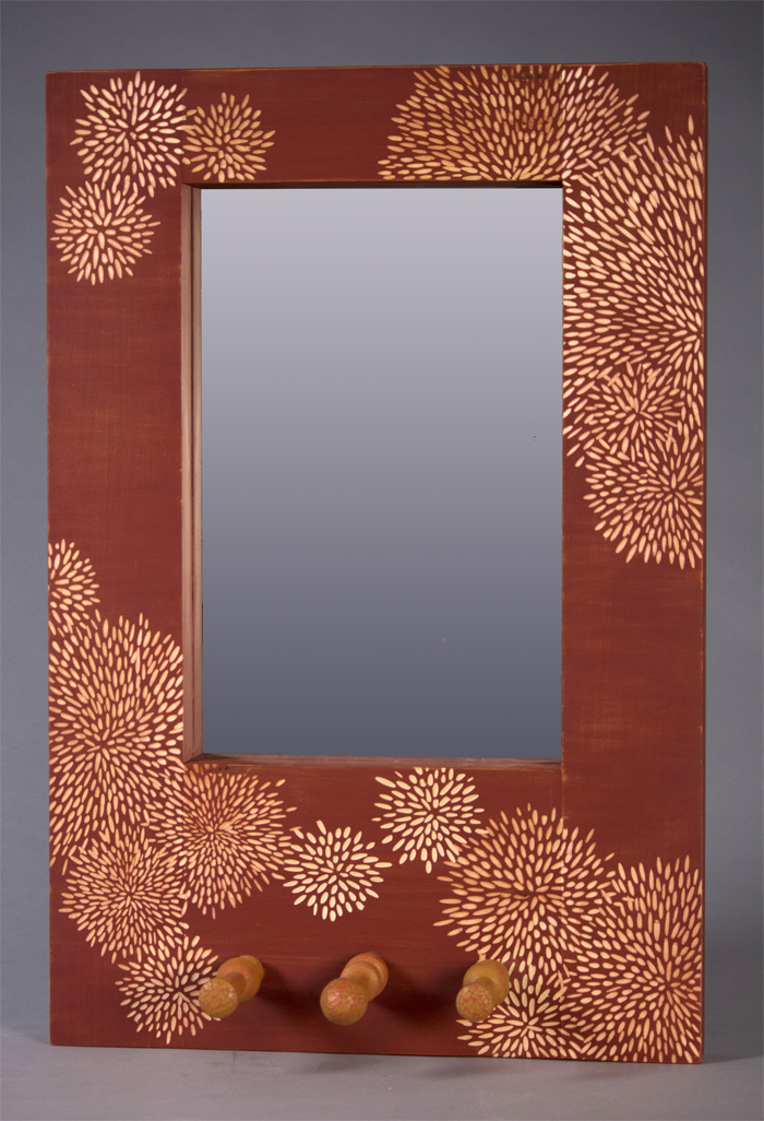 A decorative wooden frame by student Abby Moore.
