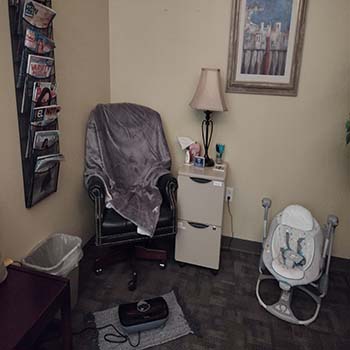 Lactation Room - chair, baby seat, magazines