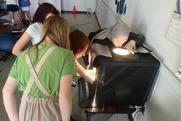 Photography students develop their photos. 