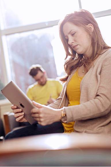 Student holding iPad