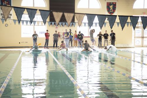 E-Day students have a pool race
