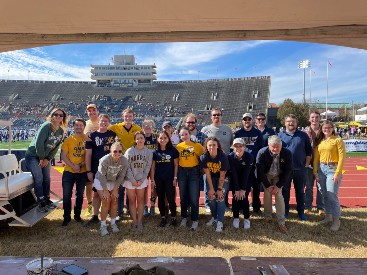 Honors College students pose at Tent City.