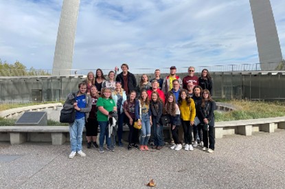 Honors College students pose in front of the St. Louis Arch on a recent weekend trip.