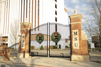 Murray State campus gates are decorated with a holiday wreath.