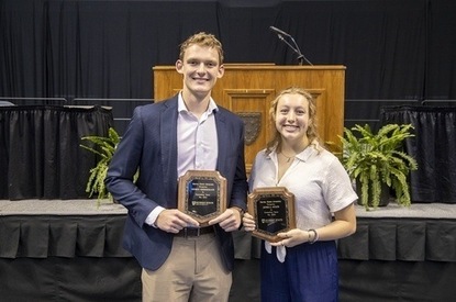 Outstanding Senior Graduates George Timmermann and Jessica Stein are pictured with their awards.