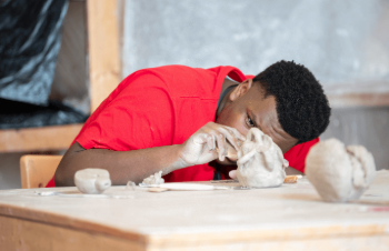 Camperworking on clay project