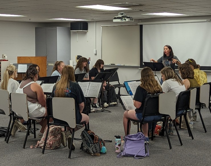 Students practice vocal exercises