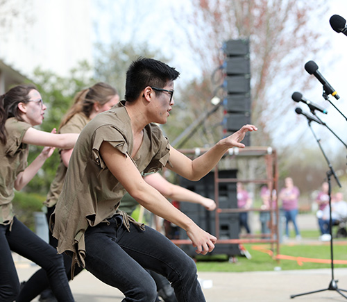 Man and women perform Thriller at All Campus Sing