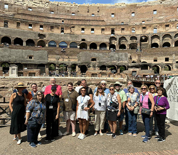 Group photo at the Colosseum