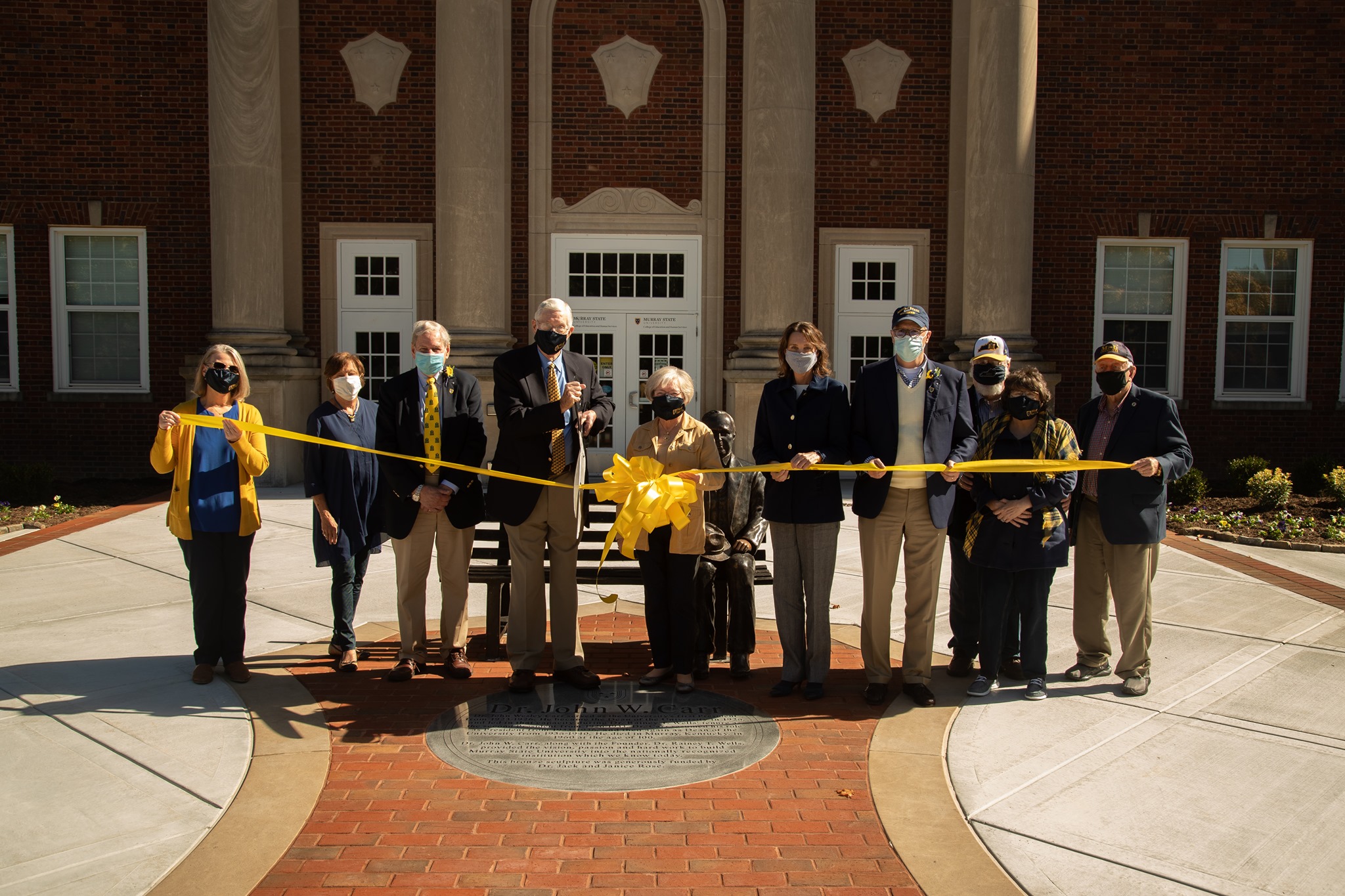 Carr statue ribbon cutting