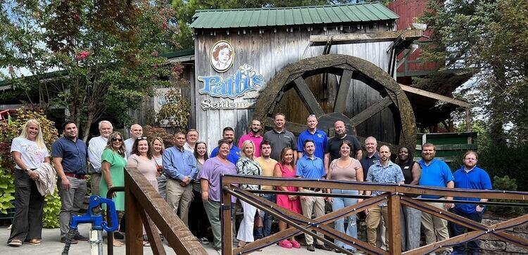 Group poses at Patti's