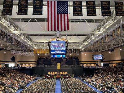 A photo of the CFSB Center at Fall 2025 Commencement. 