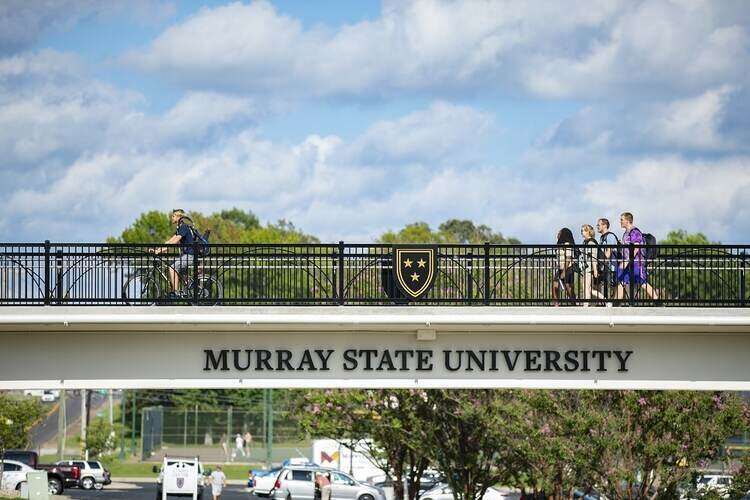 Freshmen crossing new pedestrian bridge