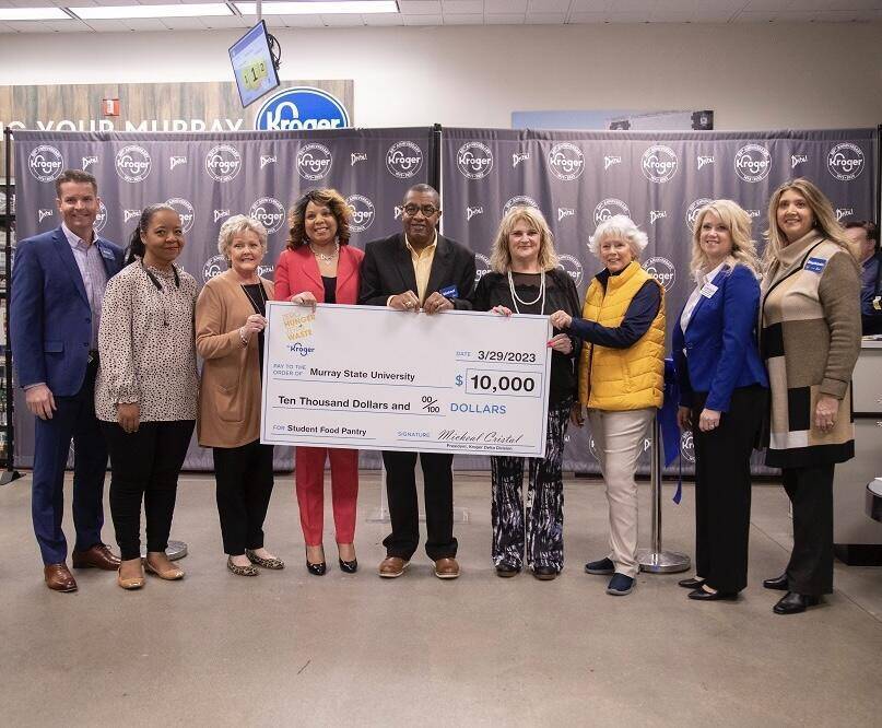 Check presentation from Kroger to Racers Helping Racers food pantry