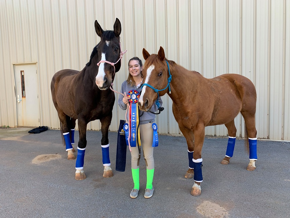 Murray State University Hunt Seat Equestrian Team member Gabrielle Lee with Max and Harmony