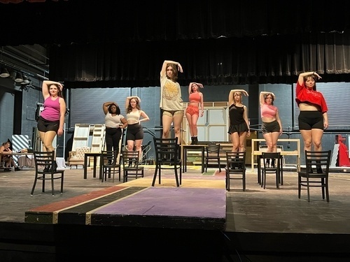 cast members practicing for their performance of Cabaret