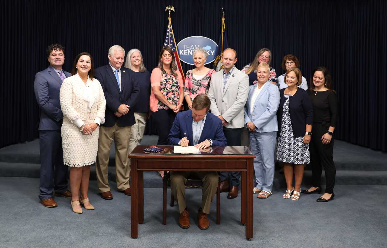 Kentucky Governor Andy Beshear signs the OT Compact Agreement or House Bill 213.