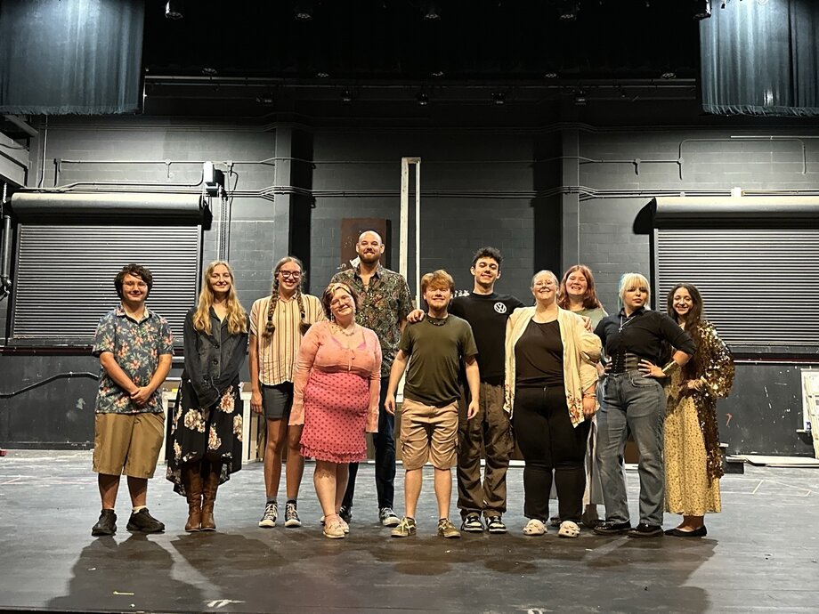 A group of students, the cast of Beanstalk! The Play!, pose for a photo together.