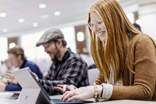 woman typing on computer
